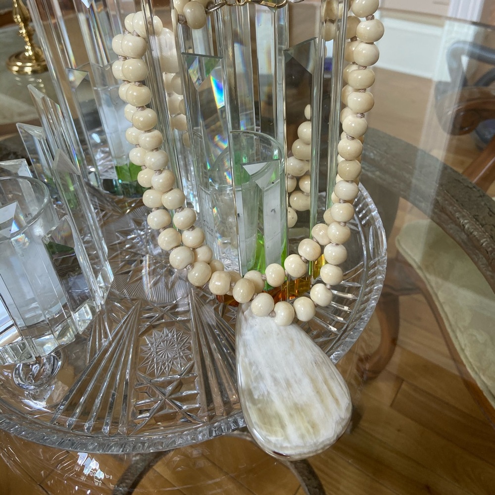 Nest ivory beaded pendant necklace